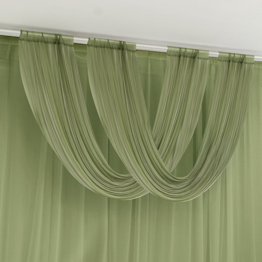 Green sheer curtains draped elegantly in a soft wave formation.