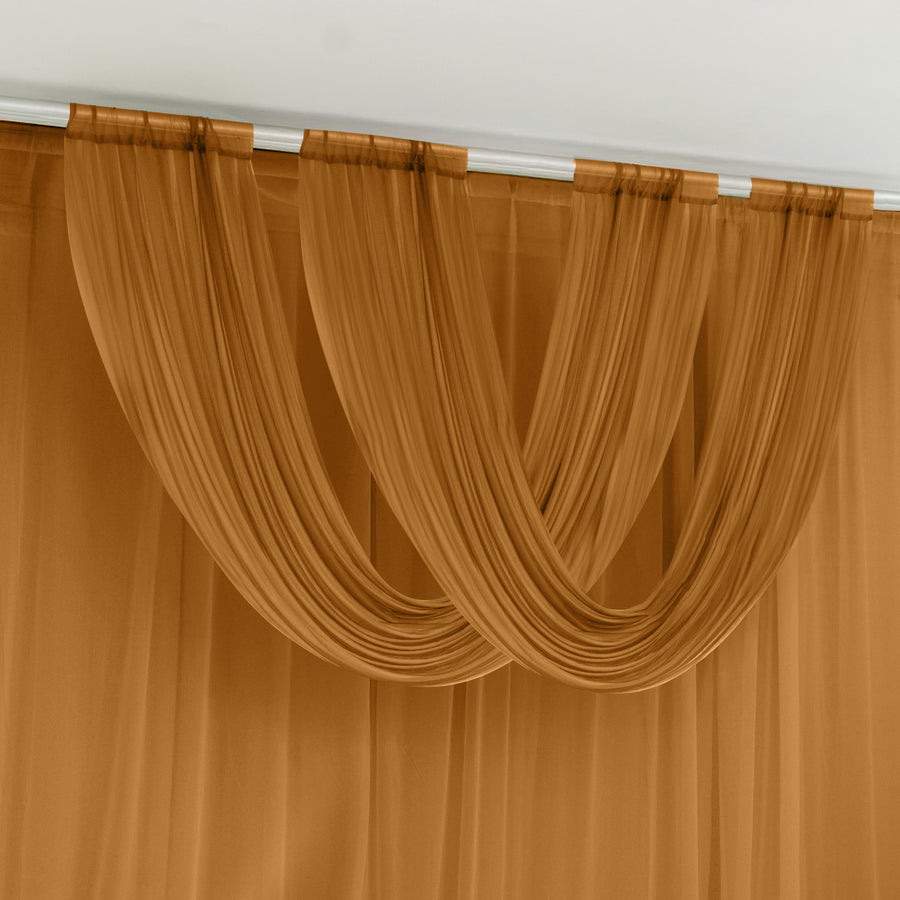 Brown sheer curtain drapes elegantly in soft folds.