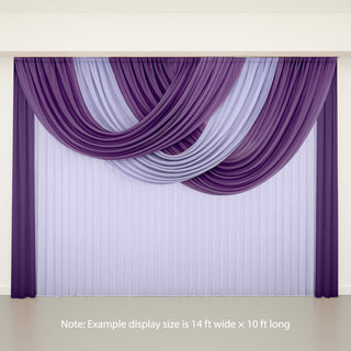 Purple and lavender drapery backdrop for event displays.