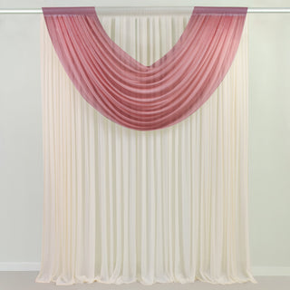 Sheer draped curtains in soft gradient colors of pink and cream