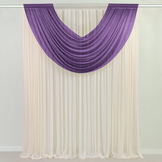 Purple and cream draped fabric backdrop for events or photography.