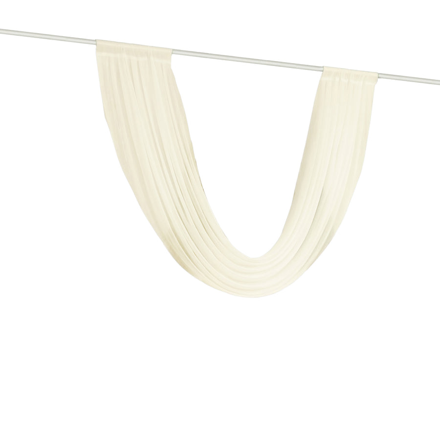 Sheer ivory curtain panel on rod against white background