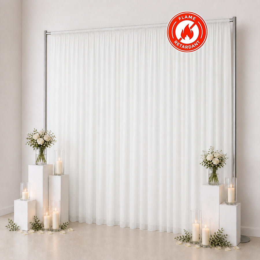 White flame-retardant wedding backdrop curtain with candles and flowers