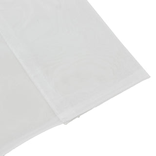 White textured fabric close-up on a light background