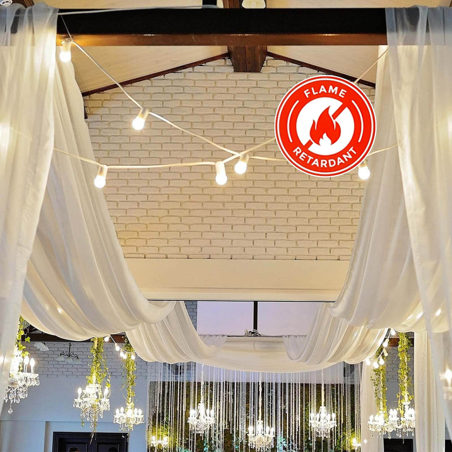 Flame retardant drapery with decorative lighting in an elegant indoor setting.