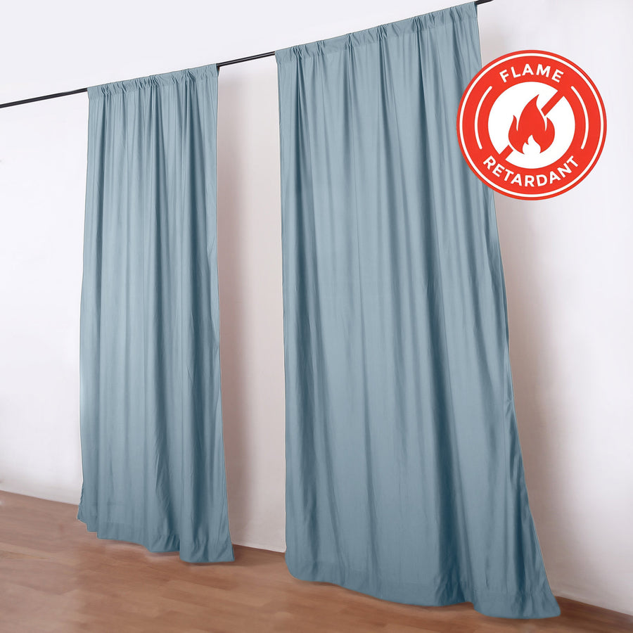 Flame retardant blue curtains on rod in a minimalist room