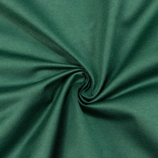 Green ribbed fabric swirl texture close-up#whtbkgd