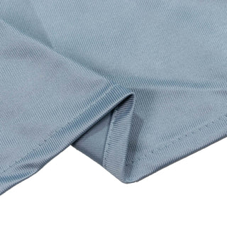 Light blue ribbed fabric close-up with hem detail
