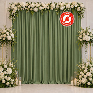 Elegant green wedding backdrop with white flowers and flame retardant sign