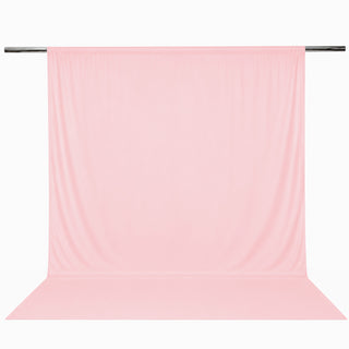 Pink sheer curtain hanging from a chrome rod on a white background#whtbkgd