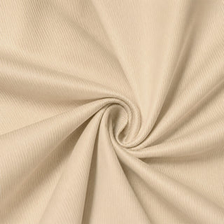 Cream ribbed fabric texture with soft spiral folds