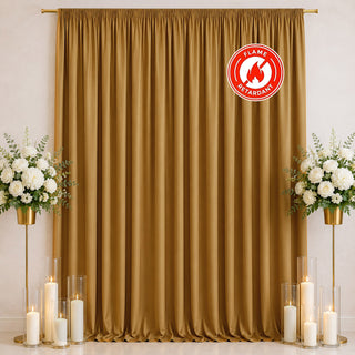 Gold flame-retardant curtain with white floral arrangements and candles