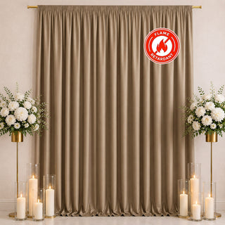 Gold flame retardant curtain backdrop with candles and floral arrangements