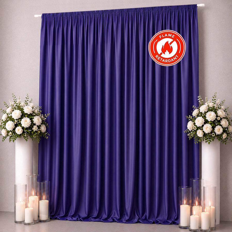 Purple flame-retardant curtain backdrop with floral arrangements and candles