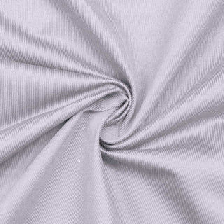 Light gray ribbed fabric texture with spiral folds close-up