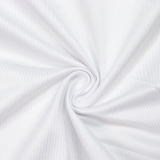 White folded fabric texture with soft swirl pattern background