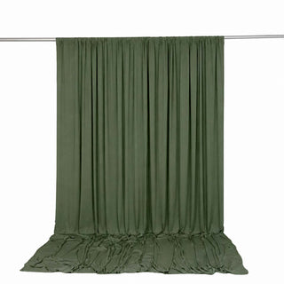 Olive green draped fabric backdrop on seamless studio backdrop stand