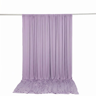 Lavender sheer curtain backdrop on rod with draped floor panel