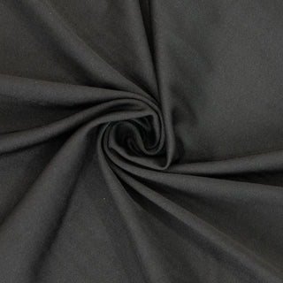 Black fabric with a smooth texture and subtle sheen. #whtbkgd