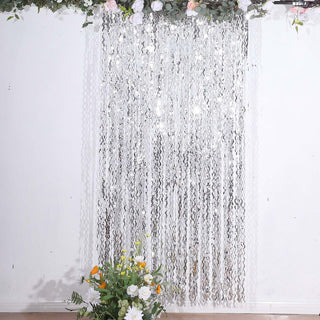 Add a Touch of Elegance to Your Event with the Metallic Silver Wavy Foil Fringe Party Backdrop Add a Touch of Elegance to Your Event with the Metallic Silver Wavy Foil Fringe Party Backdrop