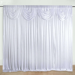 White draped fabric backdrop for photography or events