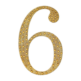 Gold marquee number 6 with bulb accents on a white background