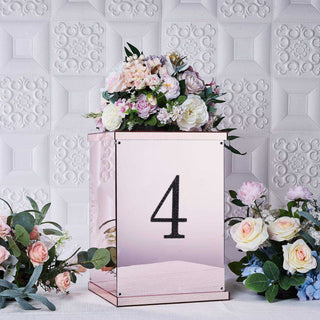 Elegant floral arrangement in a mirrored box with the number 4.