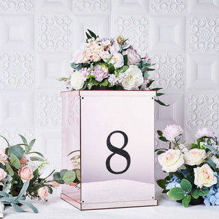 Rose gold decorative box with floral arrangement and number 8.