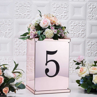 Rose gold table number holder with flowers, featuring the number 5.