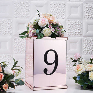 Rose gold table number holder with flowers and number 9.