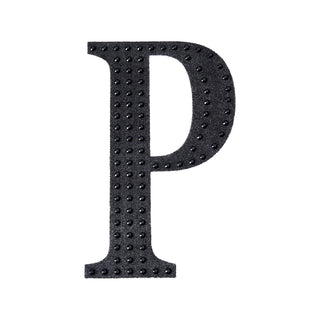 Black foam letter "P" with raised dots for texture