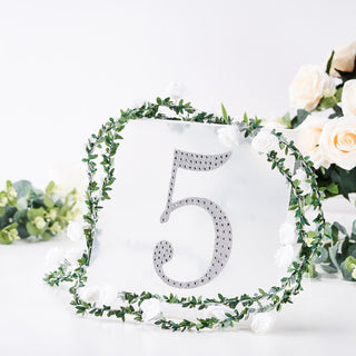 Table number 5 with rhinestones and floral decoration