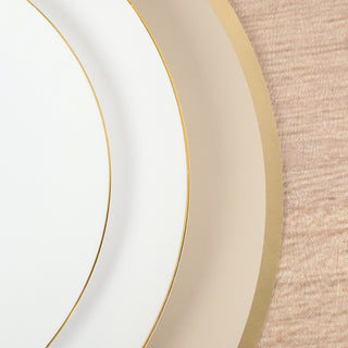 Elegant white and gold rimmed plates stacked on a textured wood surface.