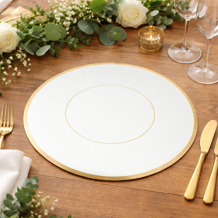 Elegant white and gold charger plate on a beautifully set dining table.