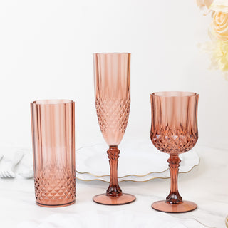 Elegant rose-colored drinkware set featuring three stylish glass designs.