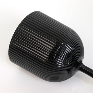 Black ribbed wine glass with a sleek design