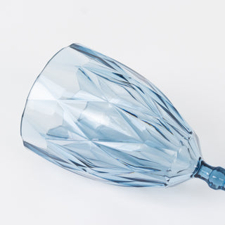 Blue crystal wine glass with a diamond cut design
