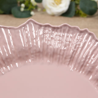 Textured pink ceramic plate with a ruffled edge, beautifully designed for dining.