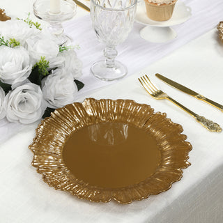 Gold scalloped edge dinner plate on a festive table setting.