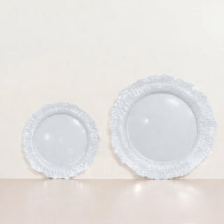 Set of two elegant white decorative plates on a neutral background