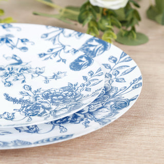 Blue floral patterned ceramic plates on a wooden table.