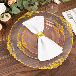 Elegant decorative plate with gold accents and white napkin, styled for dining.