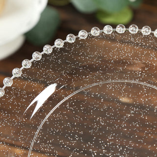 Clear decorative plate with sparkling beads around the edge.