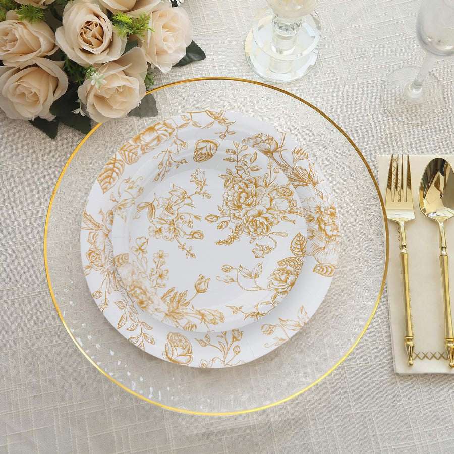 Elegant gold floral dinnerware set on a beautifully arranged table.