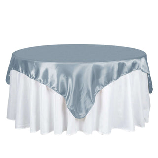 Elevate Your Event Decor with the 72" x 72" Dusty Blue Square Satin Tablecloth Overlay Elevate Your Event Decor with the 72" x 72" Dusty Blue Square Satin Tablecloth Overlay