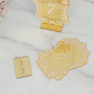 Gold table number card and holder set, elegant design for events and weddings.