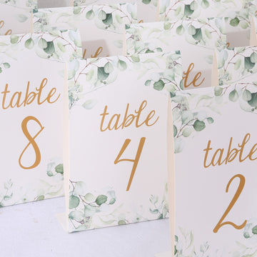 25 Pack White Green Double Sided Paper Table Sign Cards with Eucalyptus Leaves and Gold Numbers Print, 7" Free Standing Wedding Table Numbers 1-25