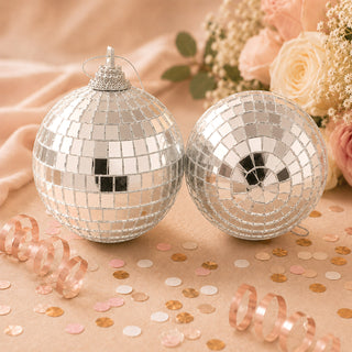 Silver mirrored disco ball ornaments with rose gold confetti and flowers