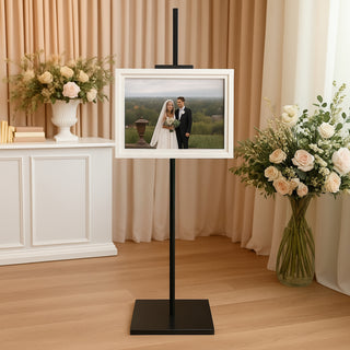 Elegant photo frame on display stand with wedding picture in a stylish setting.