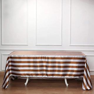 Add Elegance to Your Event with the Gold/White Stripe Tablecloth Add Elegance to Your Event with the Gold/White Stripe Tablecloth